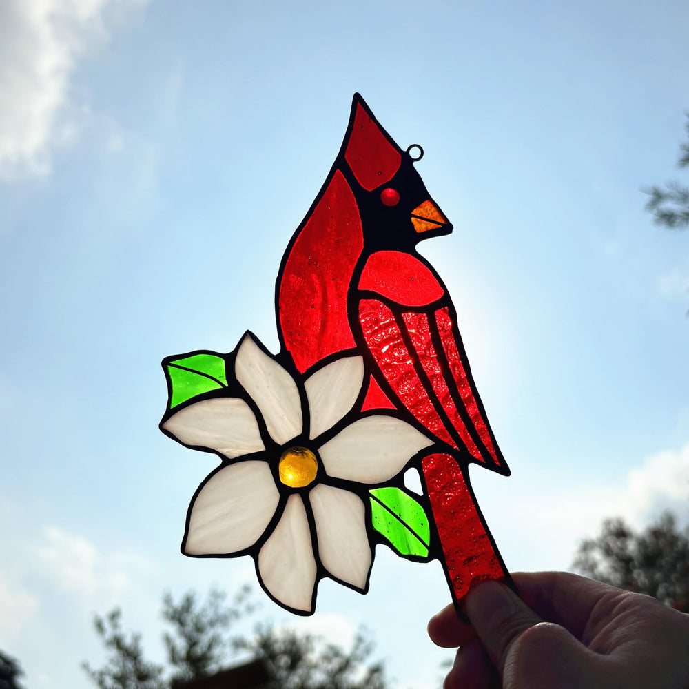 Stained glass red cardinal suncatcher close-up