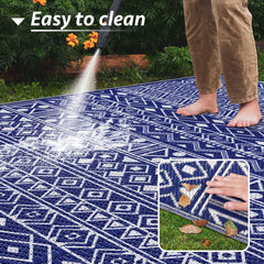 StepLively outdoor rug blue displayed on a patio