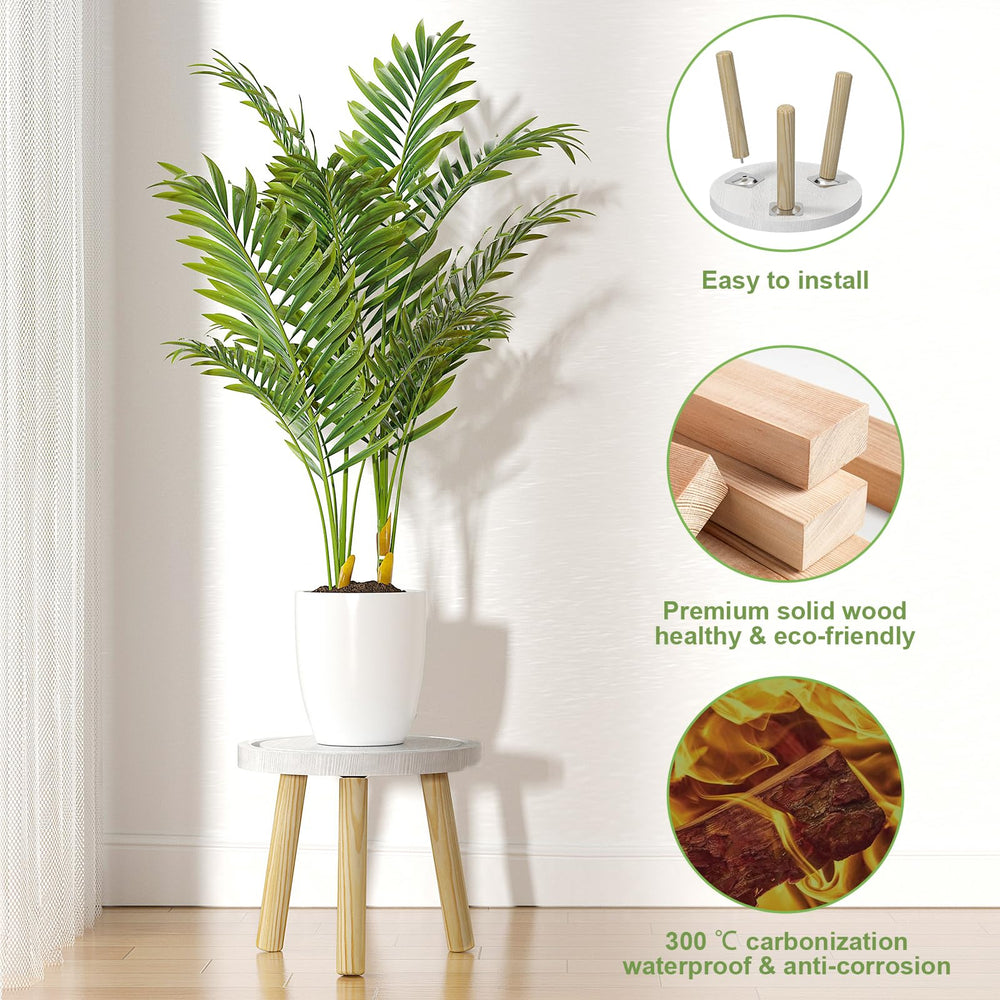 Sturdy Vecxoty plant stand supporting a large potted plant