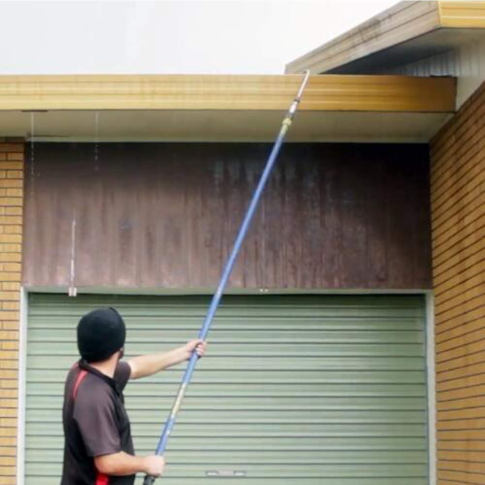 STYDDI Gutter Cleaner Attachment in use cleaning a roof