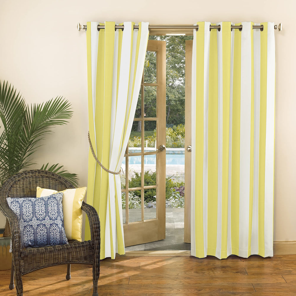 Sun Zero Valencia Cabana Stripe Curtain in a garden setting