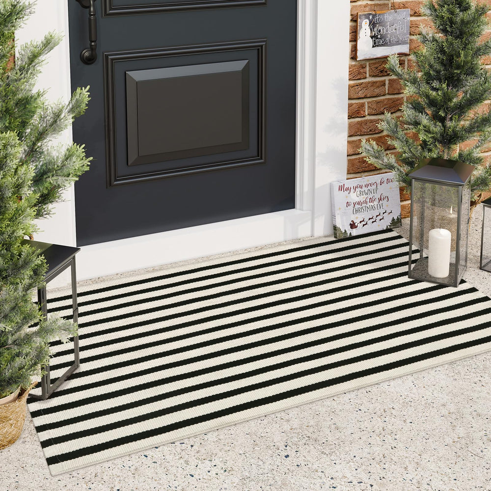 Sungea door mat on a porch with seasonal decorations