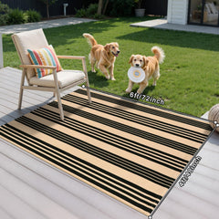 Sungea Striped Outdoor Rug 4x6ft in tan and black colour on patio