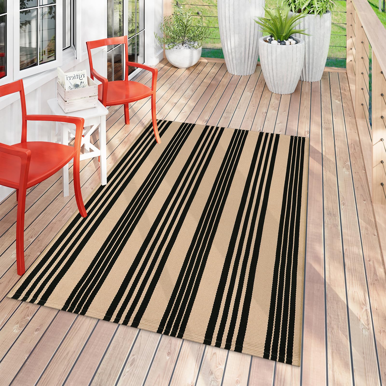 Sungea Striped Outdoor Rug 4x6ft with autumn decorations