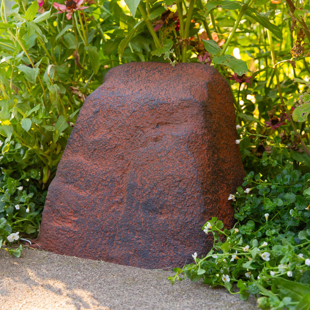 Sunnydaze 11" H faux landscape rock cover near stepping stones