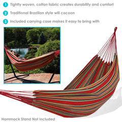 Sunnydaze Brazilian Double Hammock hanging between trees