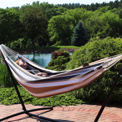 Sunnydaze Brazilian Double Hammock set up in a park