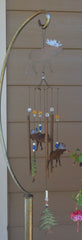 Sunset Vista Designs Moose Wind Chime hanging in a garden