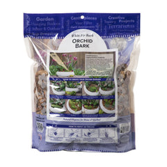 SuperMoss orchid potting bark in a decorative pot with orchids