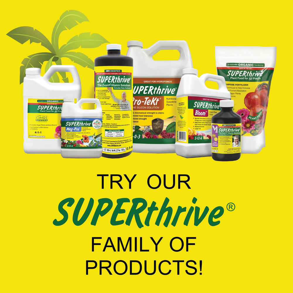SUPERthrive Plant Food bottle with plants in the background