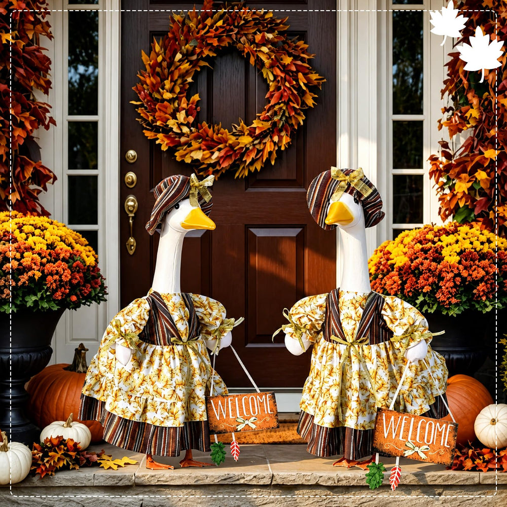 Suzile Fall Goose Outfit displayed on a porch goose statue