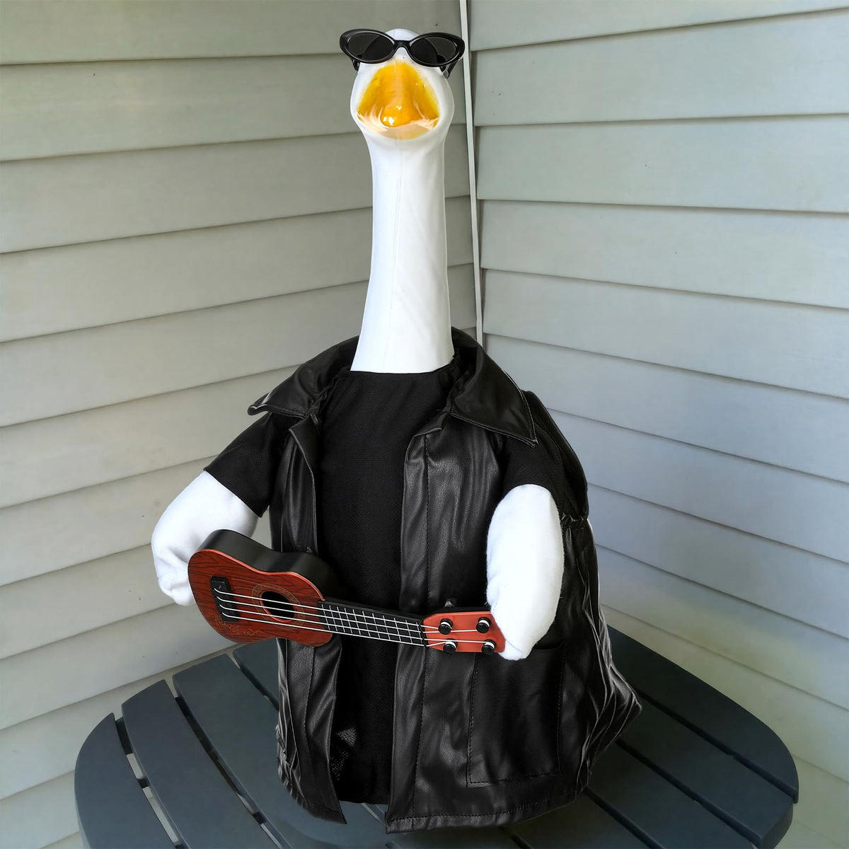 Suzile Porch Goose Costume Set front view with leather jacket and ukulele