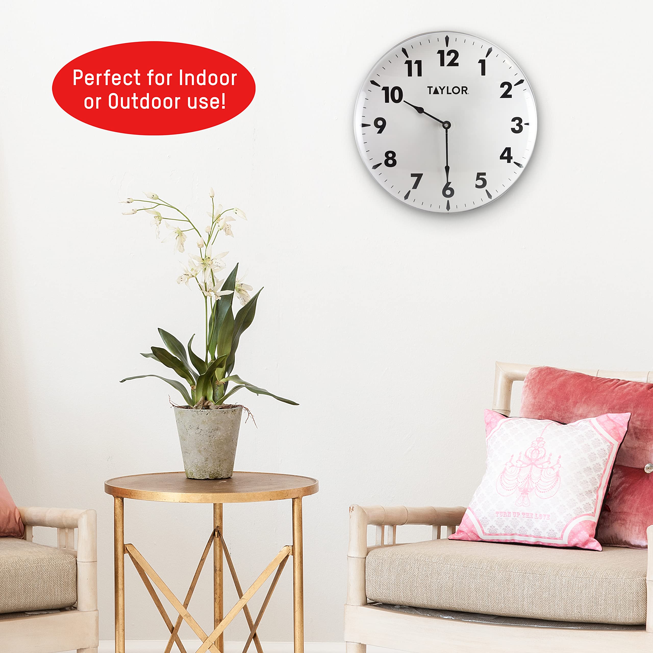 Taylor 18 Inch Jumbo Outdoor Clock next to garden decor