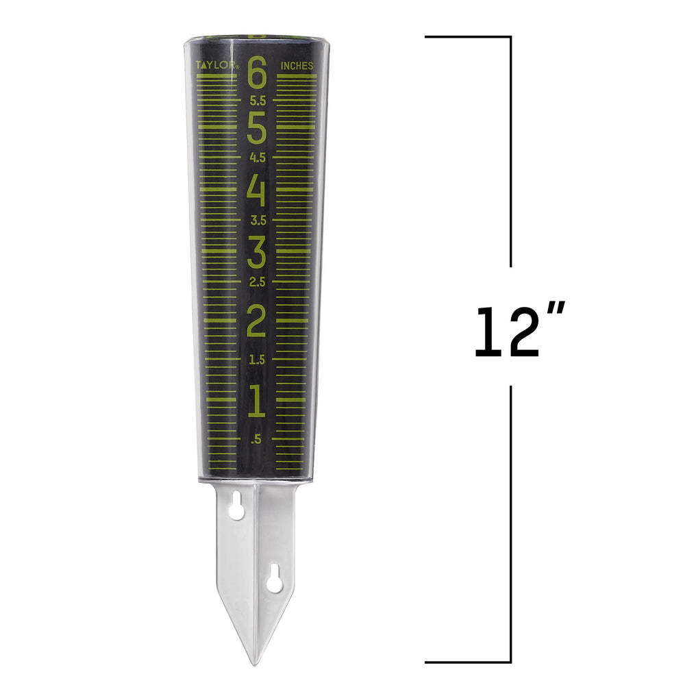 Taylor Glow-In-The-Dark Rain Gauge mounted on a post in a garden