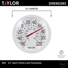 Taylor thermometer displayed outdoors on a garden wall
