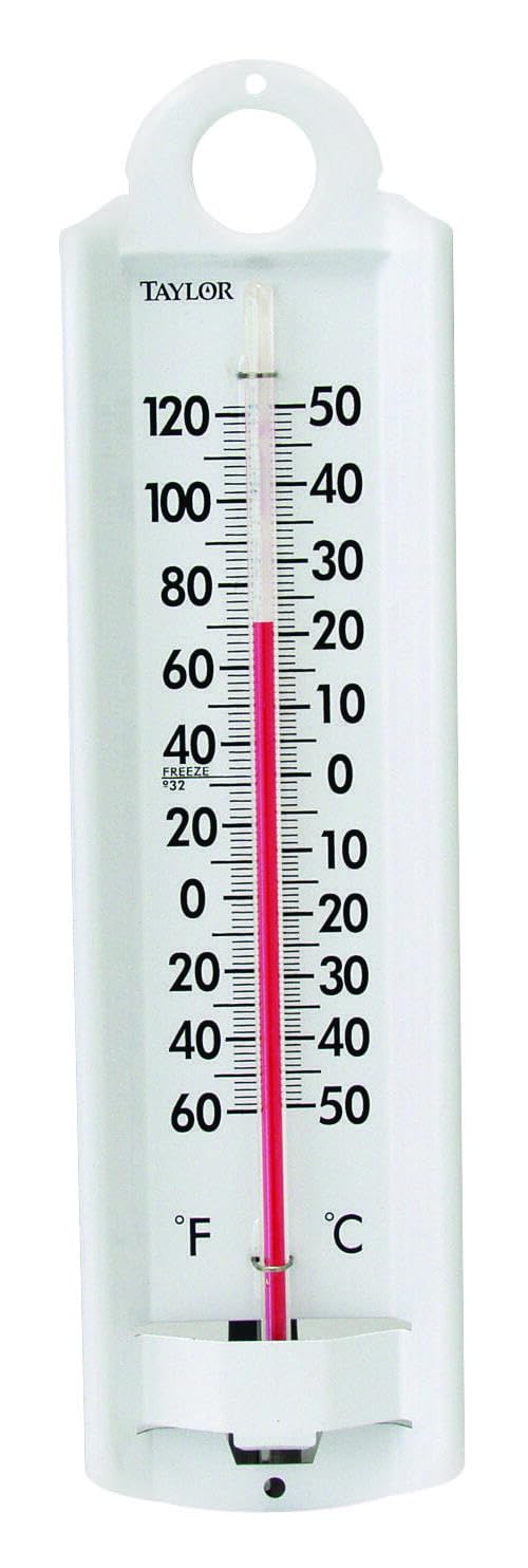 Taylor Wall Thermometer displayed on a wall outdoors