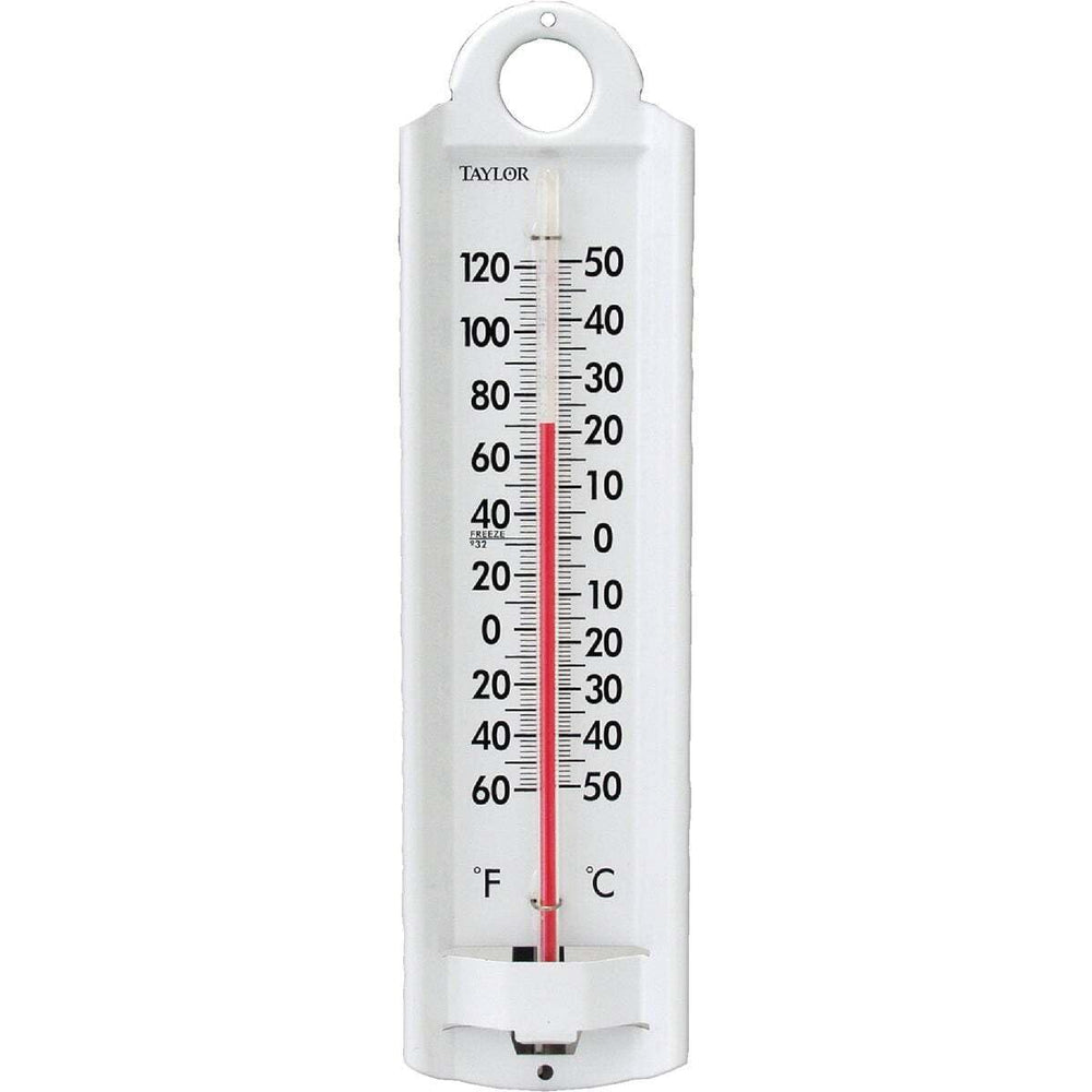 Taylor Wall Thermometer in a garden setting