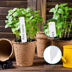TDHDIKE plant labels in a garden setting
