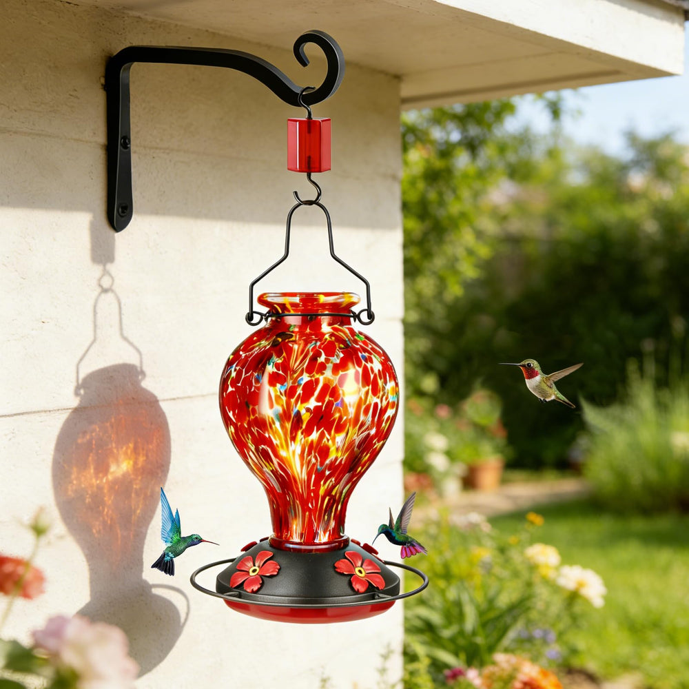 Tegarbed Hummingbird Feeder with sunlight reflection on glass