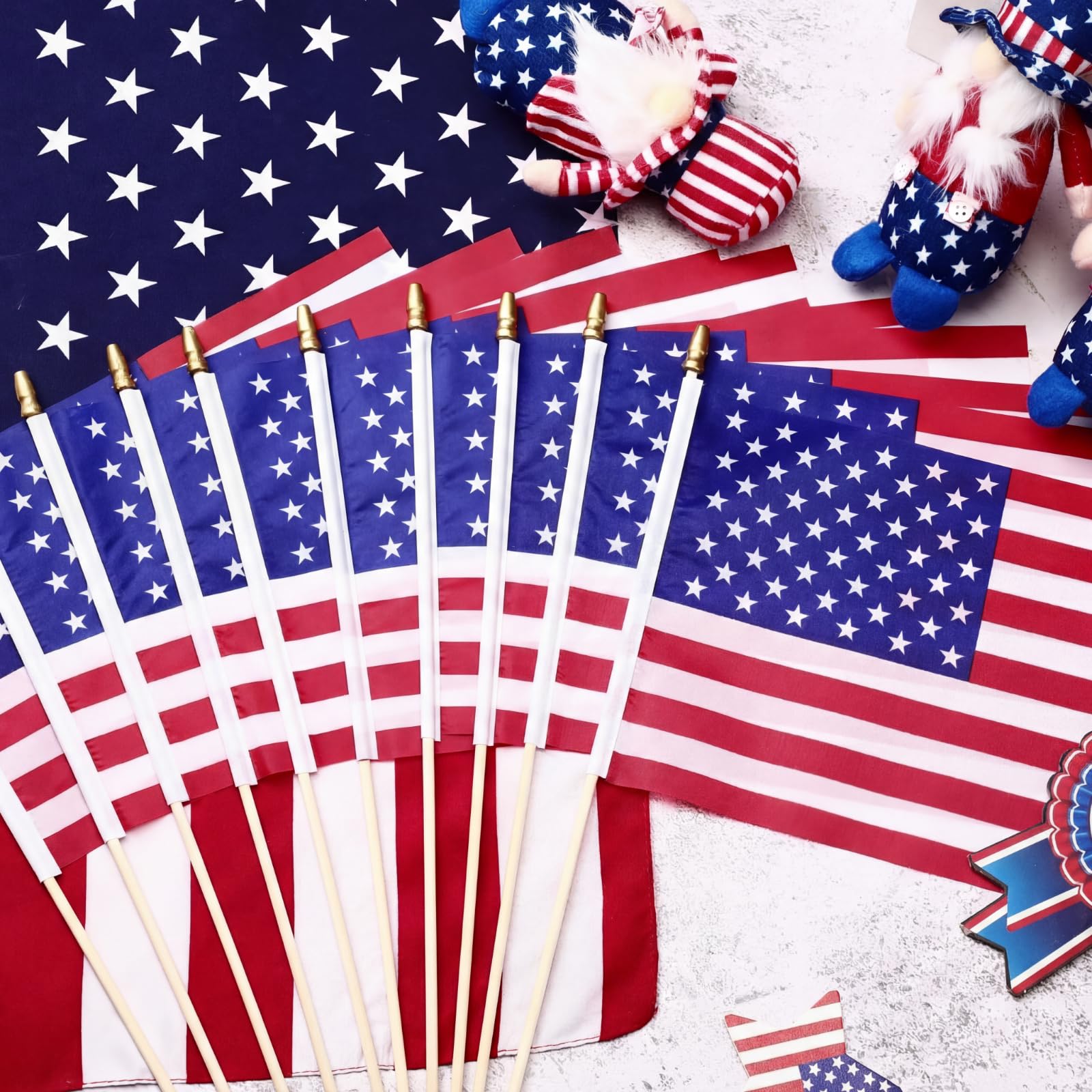 Tegeme mini American flags in a garden setting