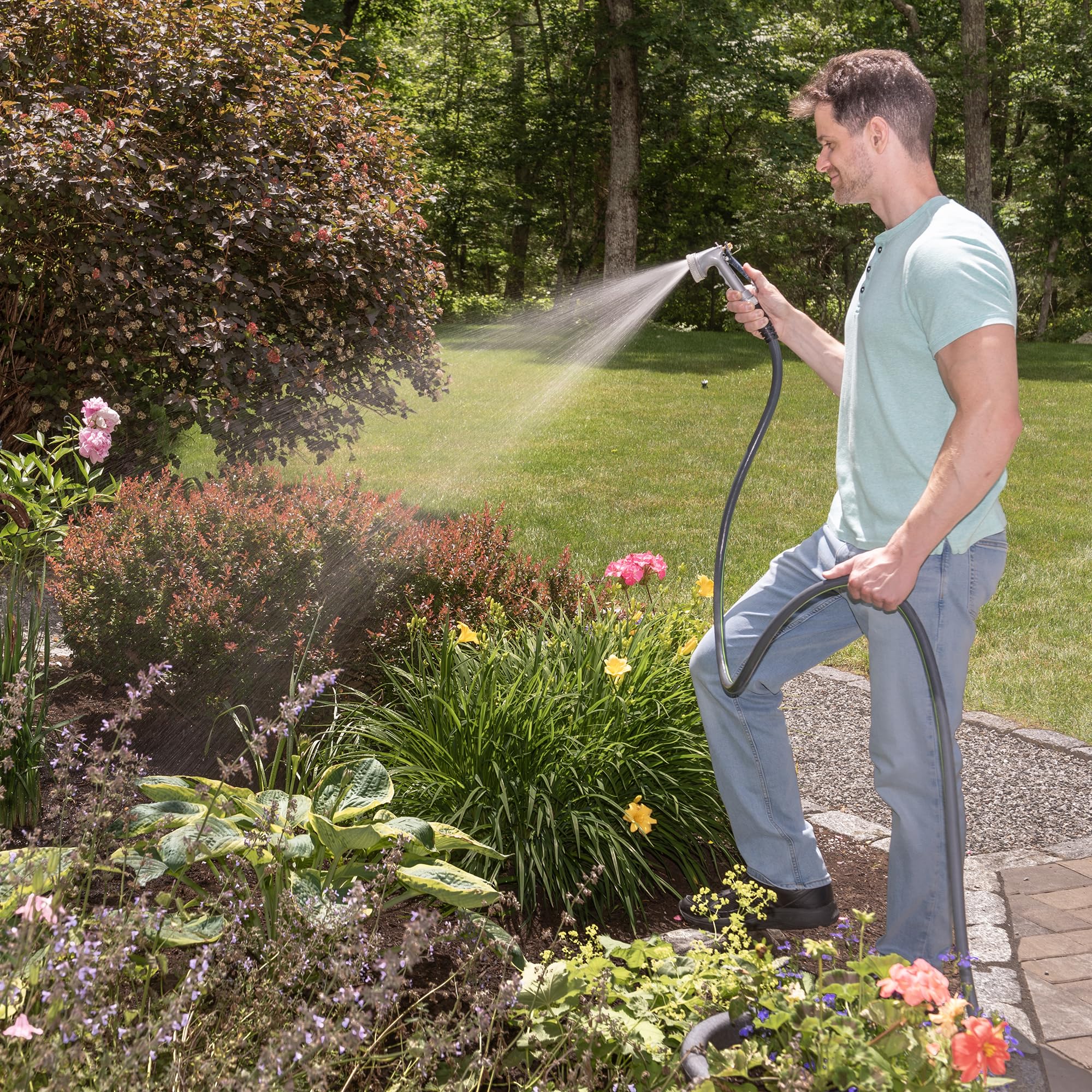 Teknor Apex Kink Control Flex Hose 50 ft in use watering garden