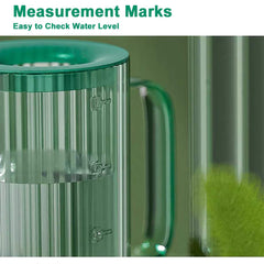 Tennedriv Green Small Watering Can filled with water