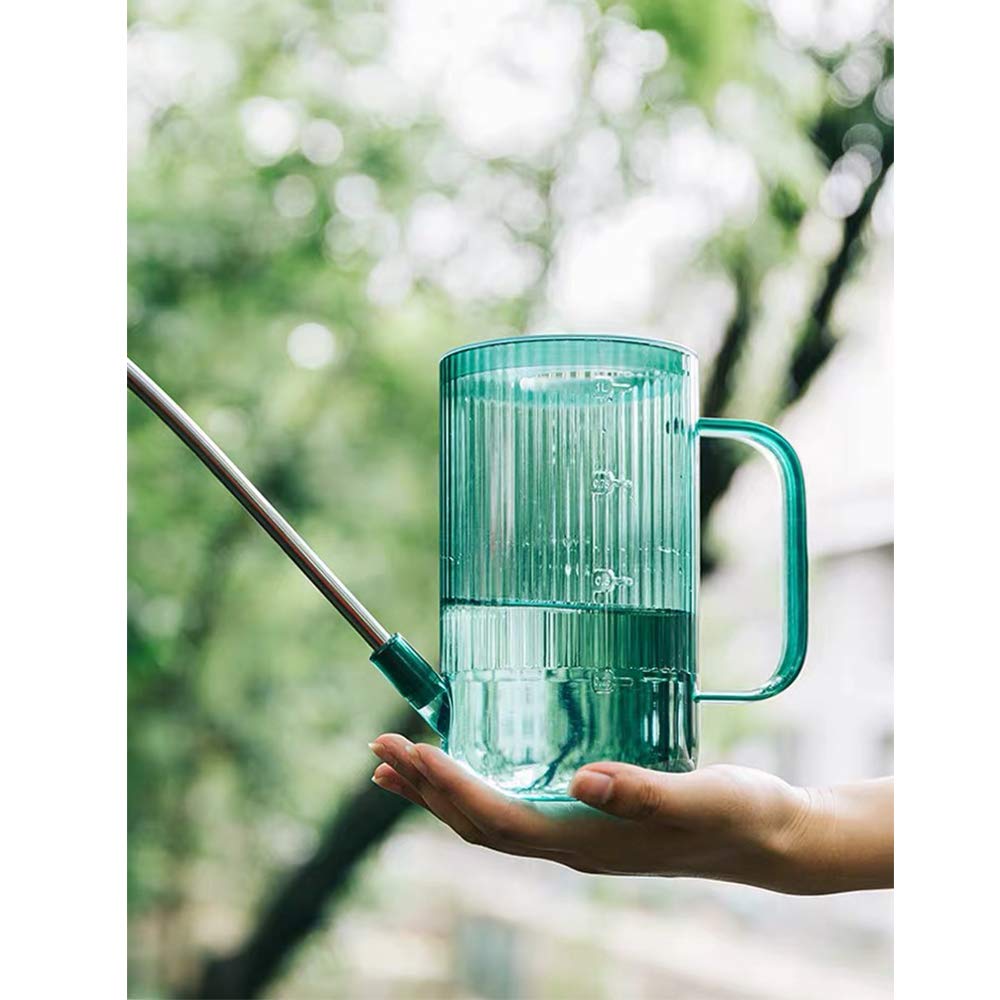 Tennedriv Green Small Watering Can in use watering indoor plants