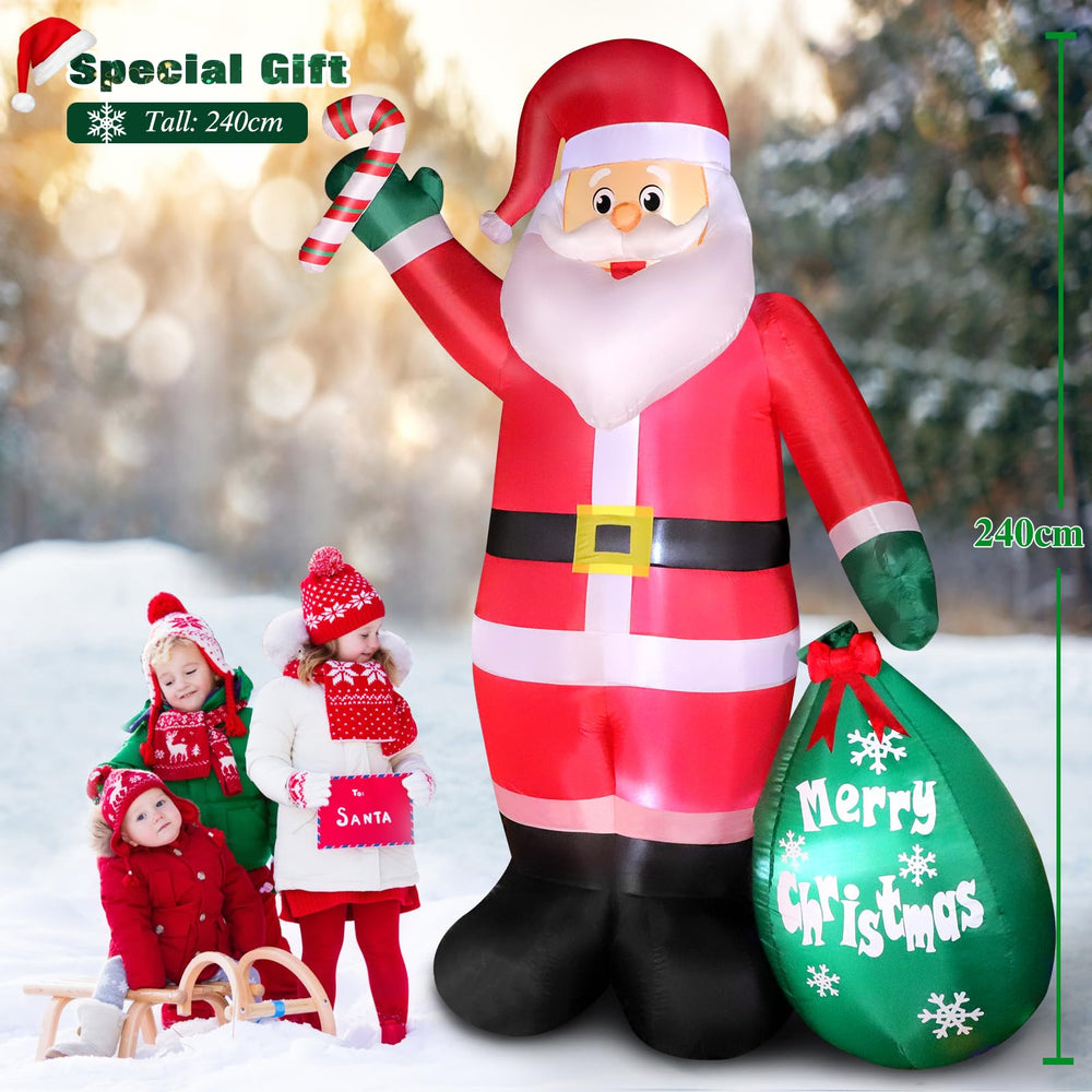 Thanger inflatable Santa Claus holding a green gift bag