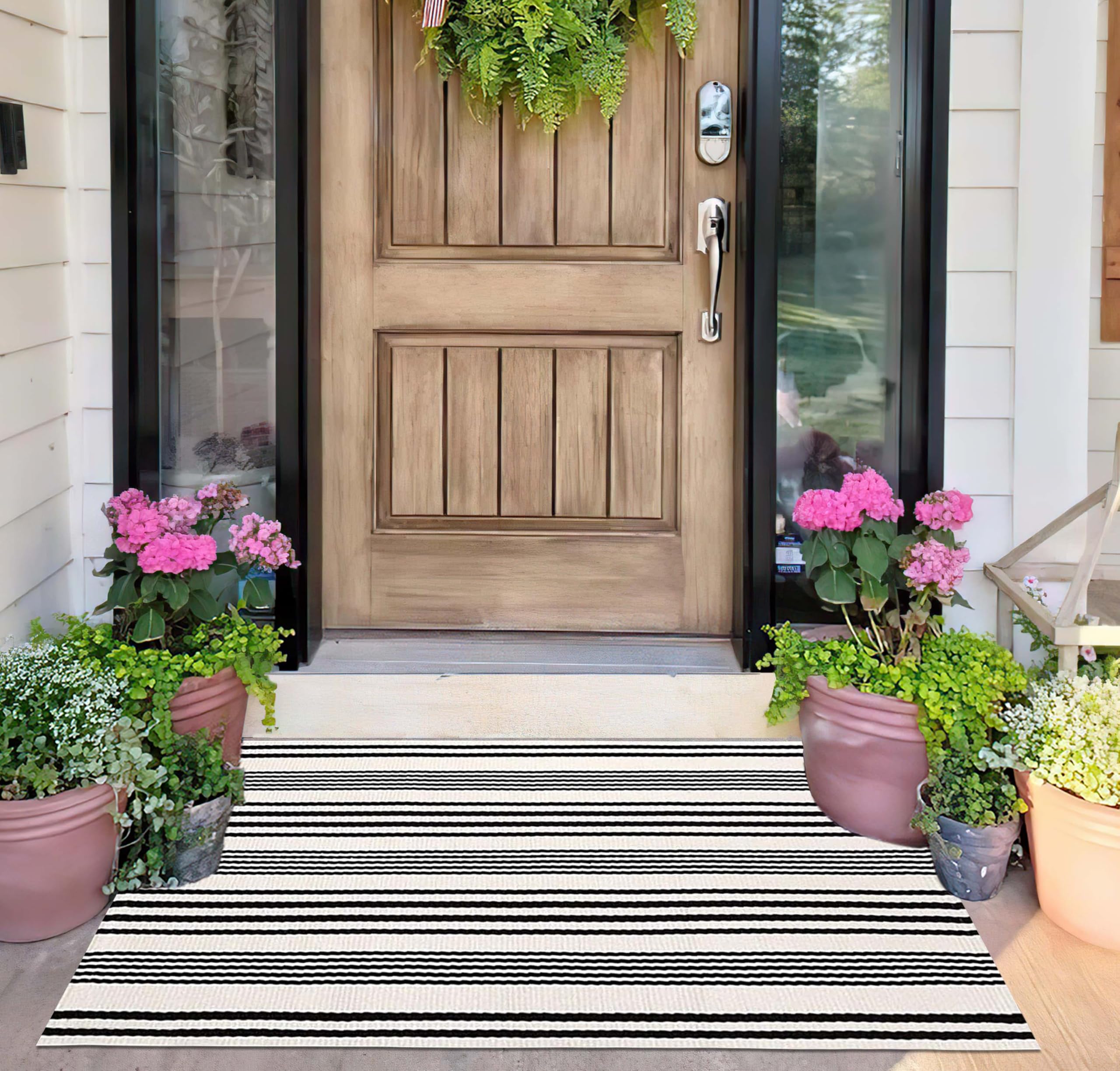 The BUAGETUP doormat in a living room setting