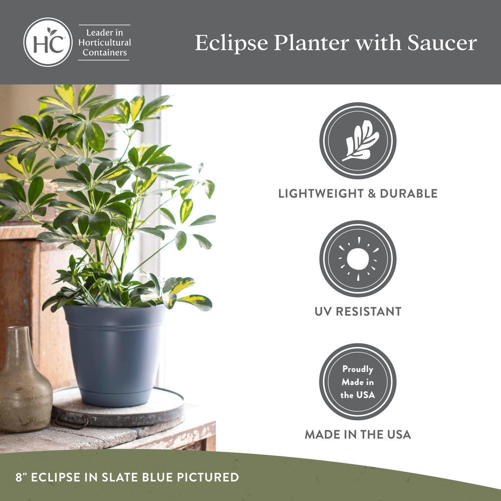 The HC Companies Eclipse Round Planter filled with flowers