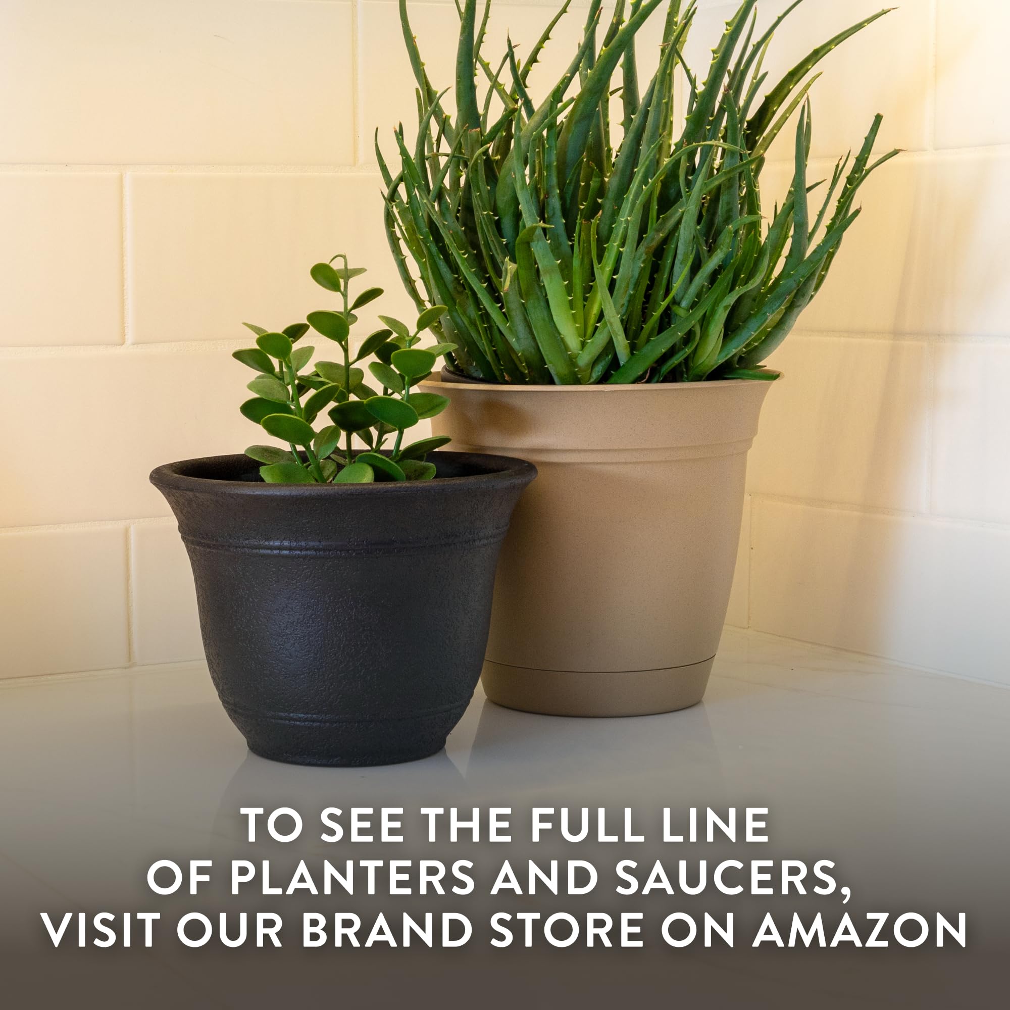 The HC Companies self-watering pot displayed indoors with greenery