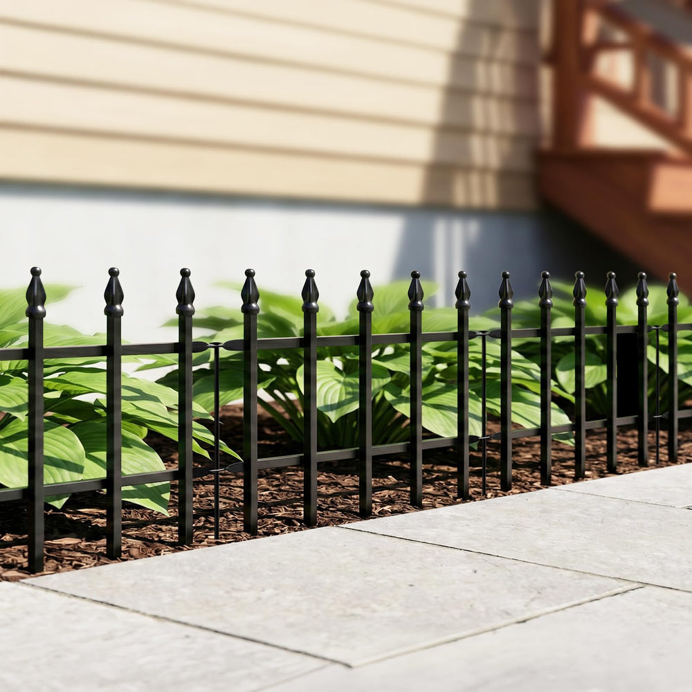 Thealyn Decorative Metal Fence set up around flower bed