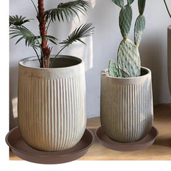 Three Bleuhome plant saucers stacked together, showcasing size