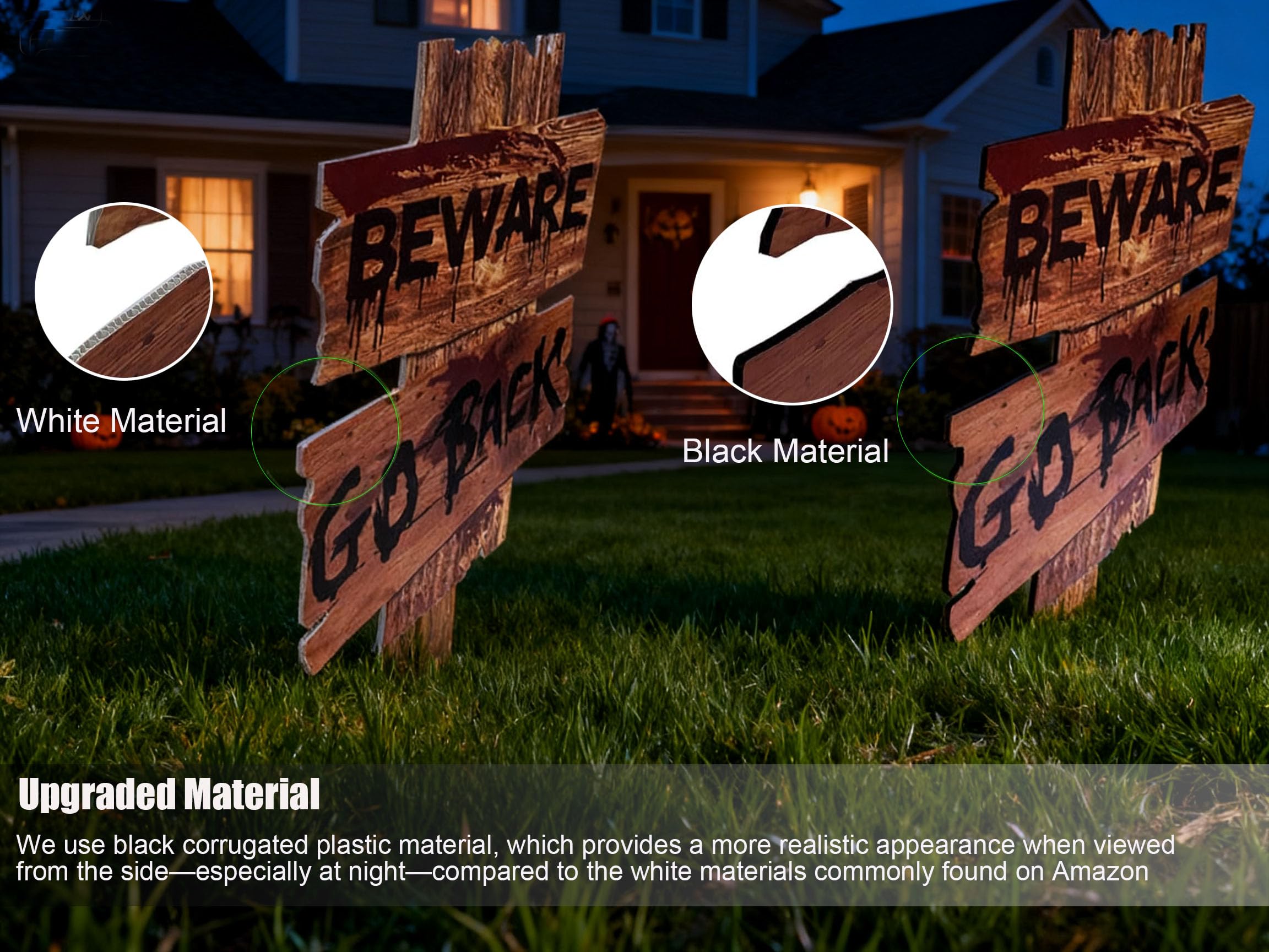 Three Halloween yard signs displayed in a garden