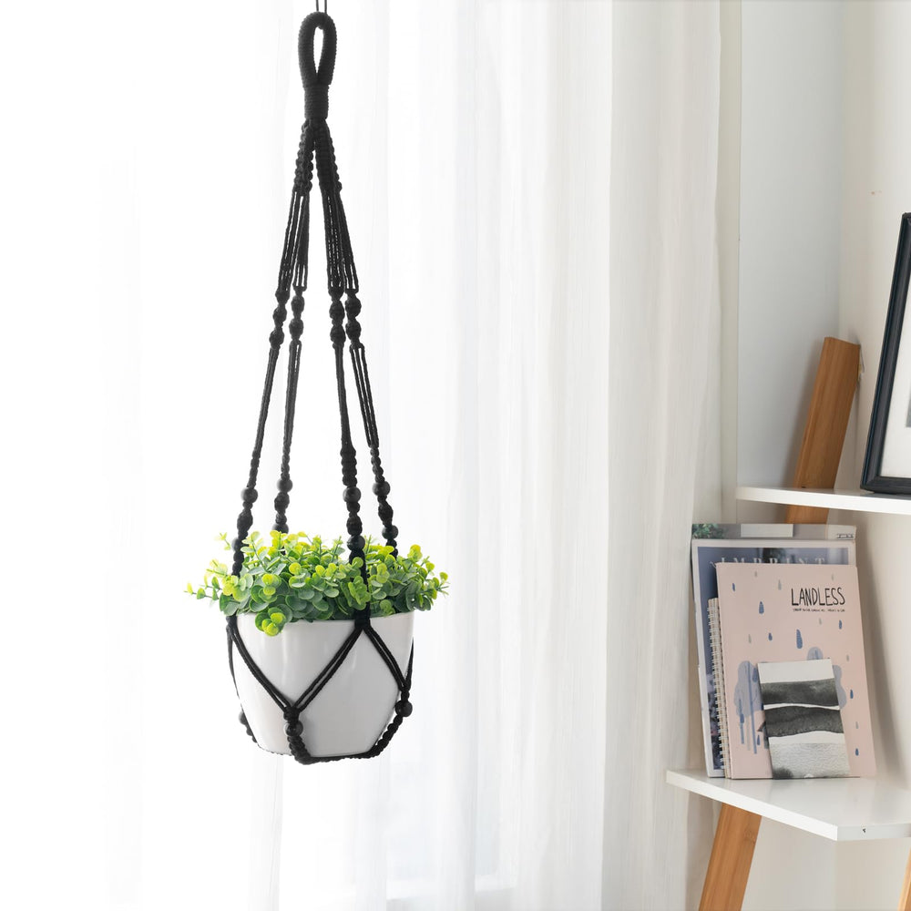 Three pack of Mkono macrame plant hangers on display