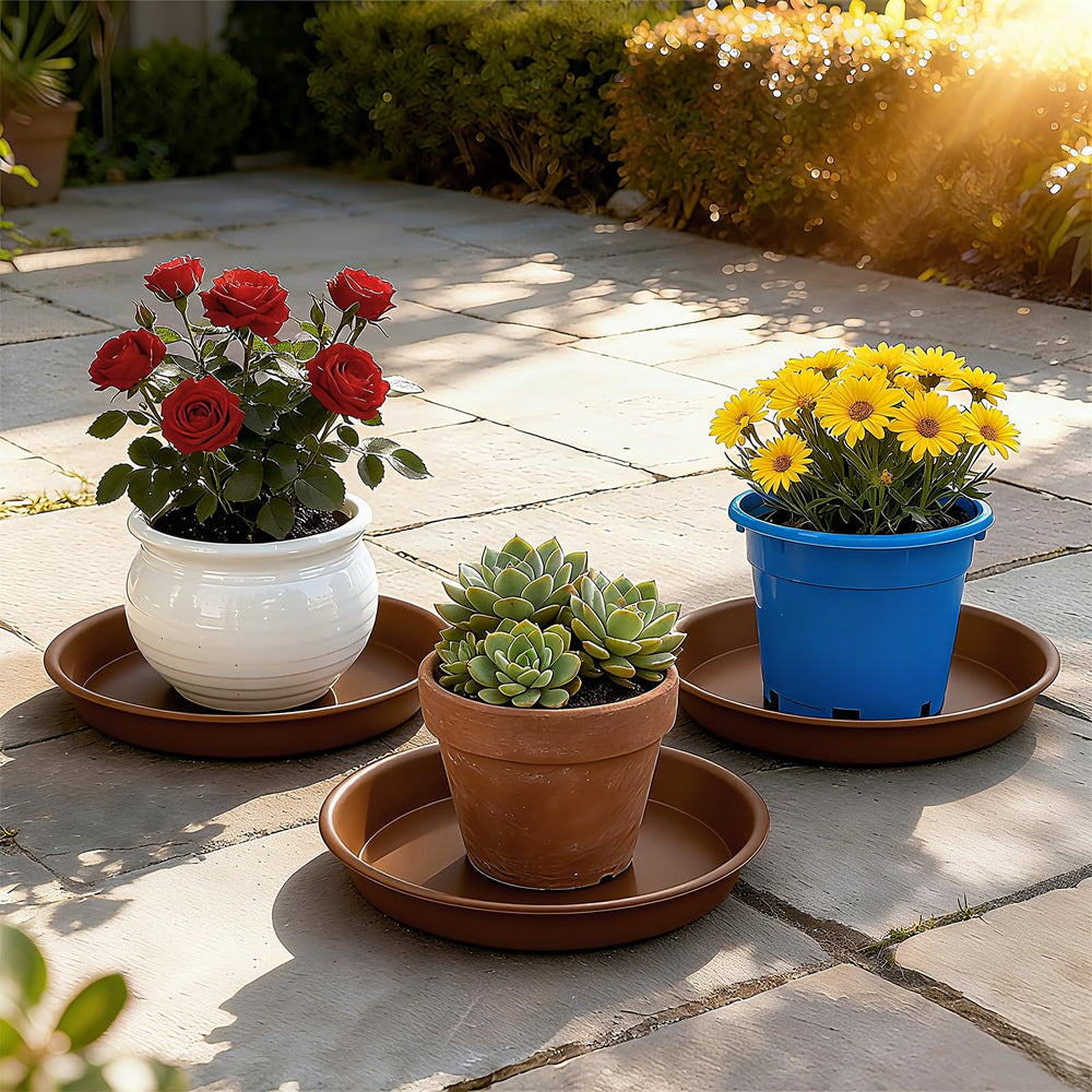 Three TITE 14 inch plant saucers stacked together