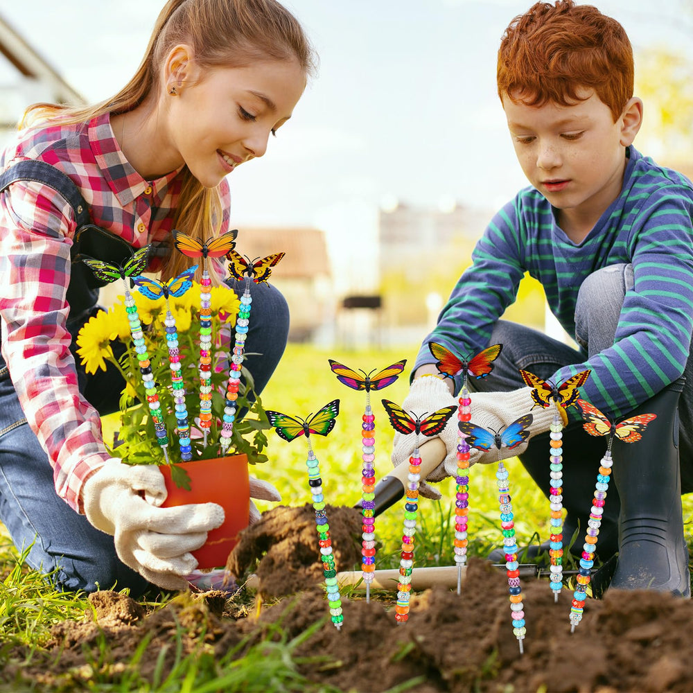 Tigeen colorful butterfly garden stakes arranged in a flower pot