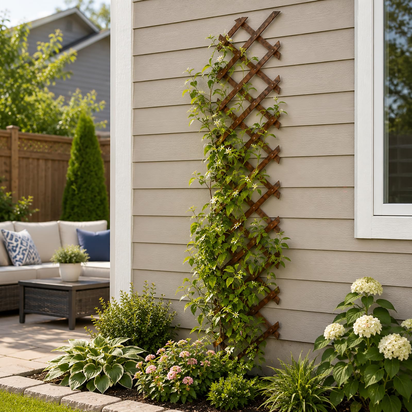 Tilinyan & one Expandable Garden Trellis placed against a wall with climbing plants