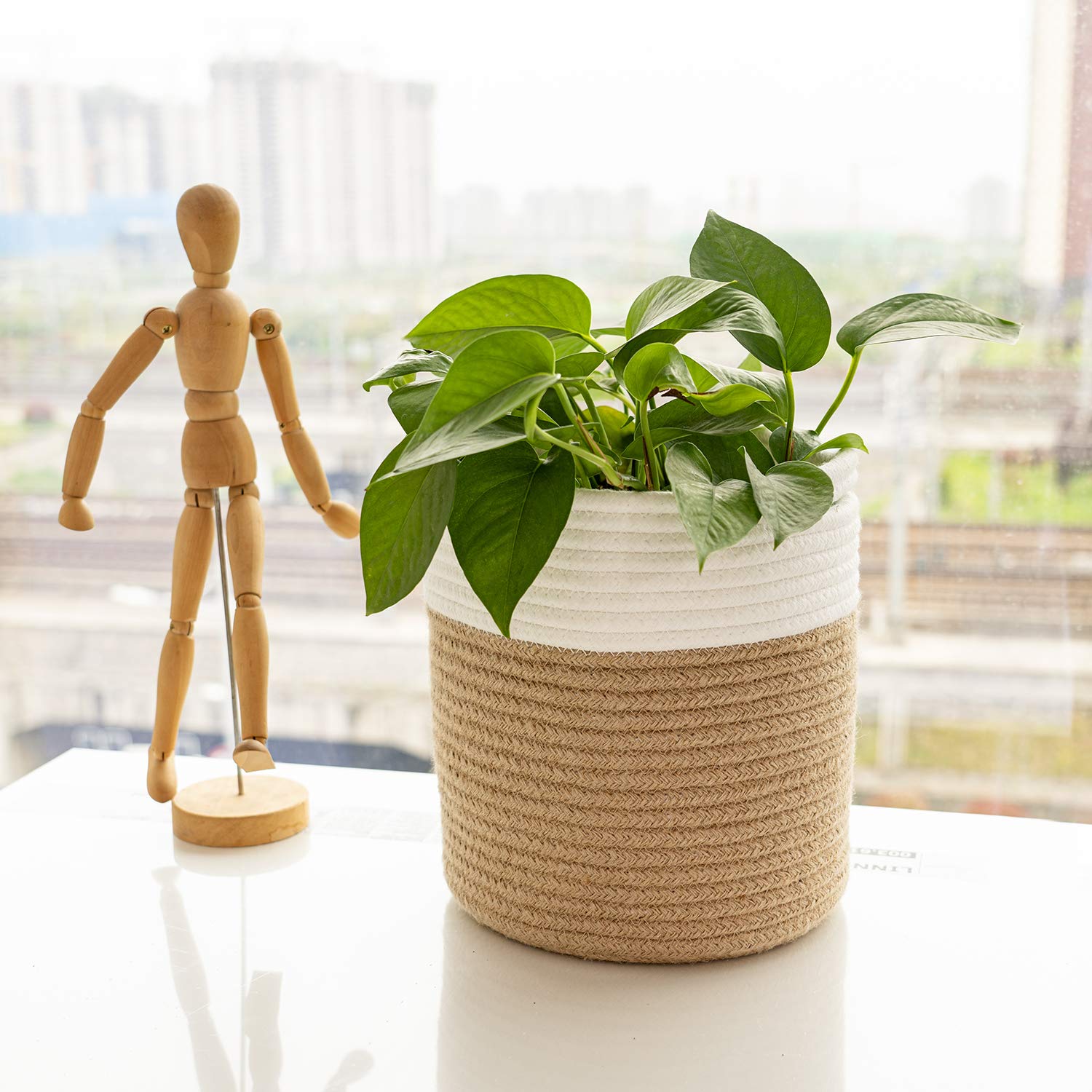 TIMEYARD Rope Plant Basket filled with a potted plant