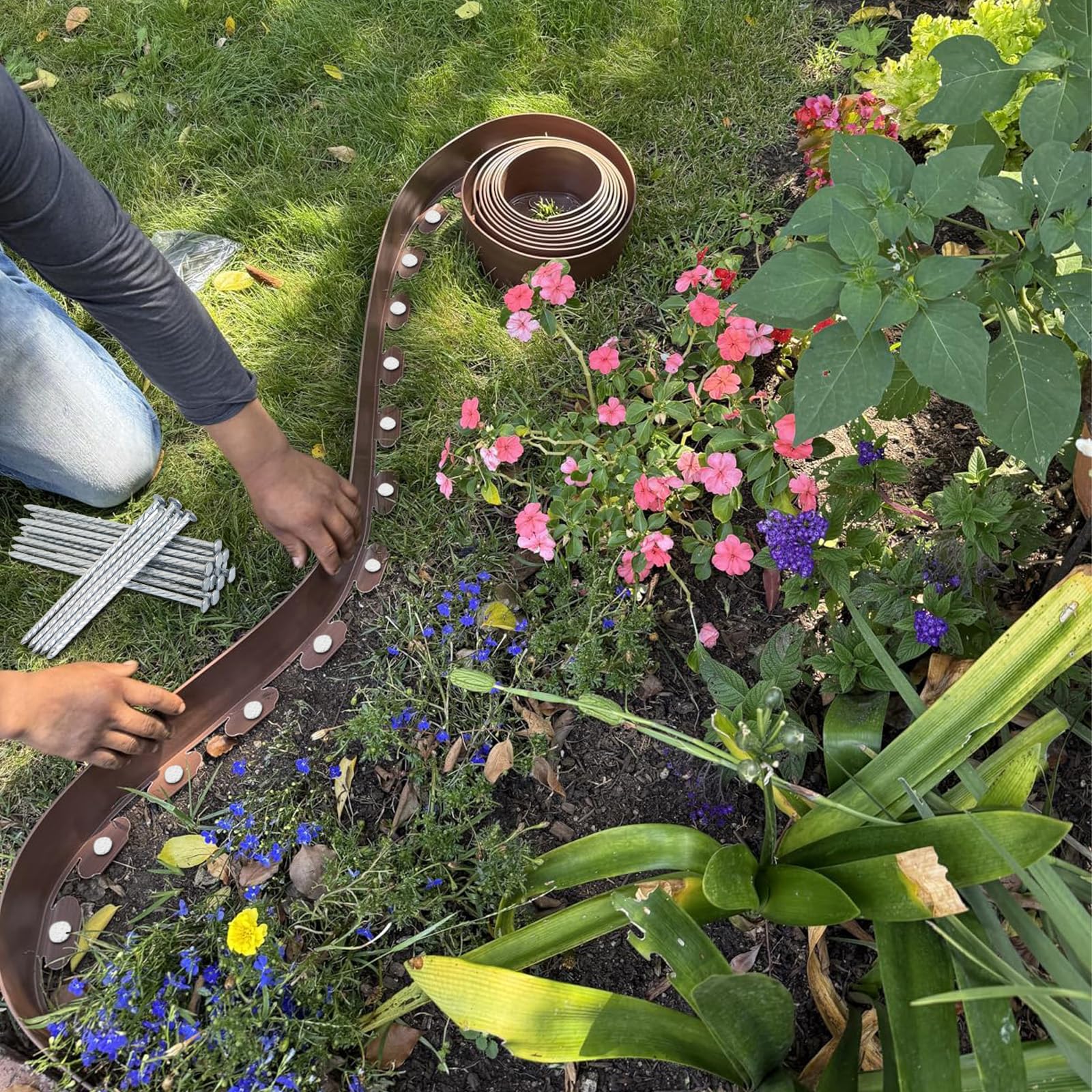 TINSKY turf nails inserted in landscape edging