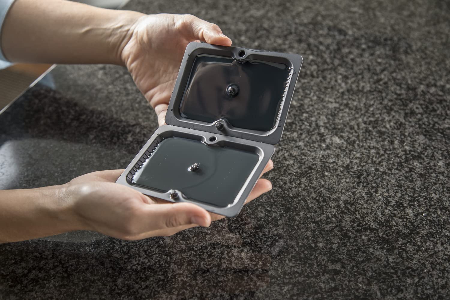 Tomcat Glue Trap placed against a wall in a kitchen