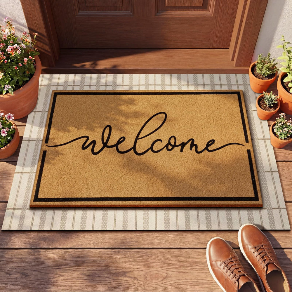 Top view of Drydiet layered doormats featuring welcome script