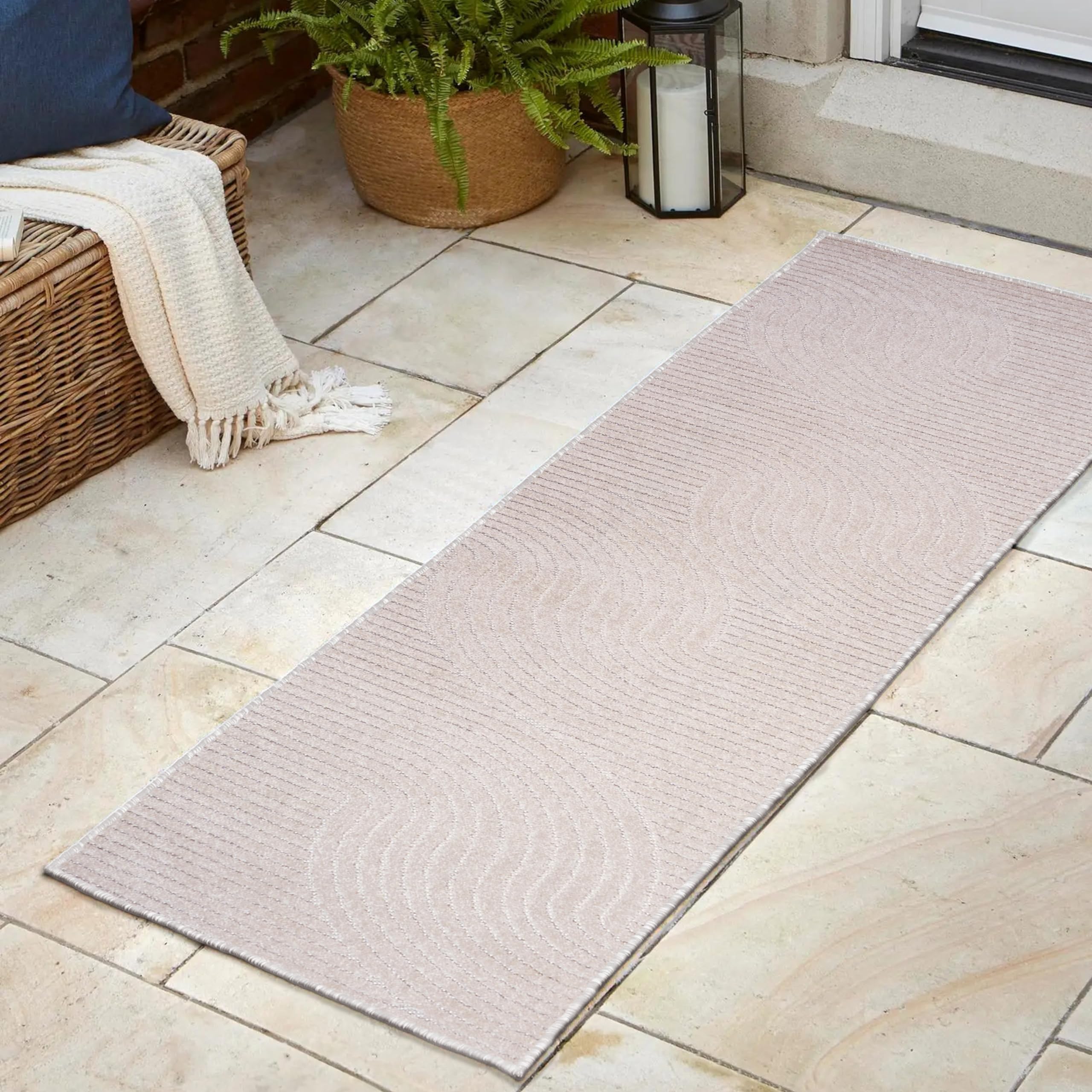 Top view of JONATHAN Y runner rug featuring curved cream lines