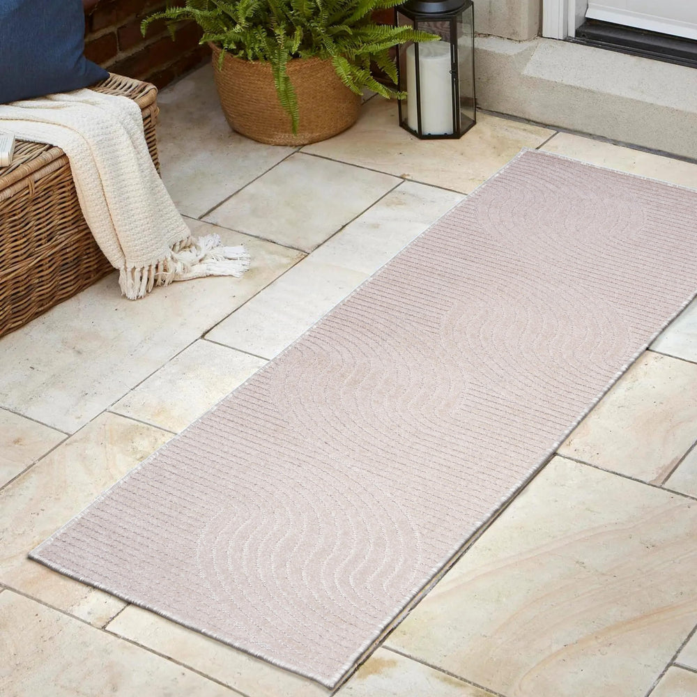 Top view of JONATHAN Y runner rug featuring curved cream lines