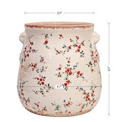 Top view of medium-sized ceramic vase with plants