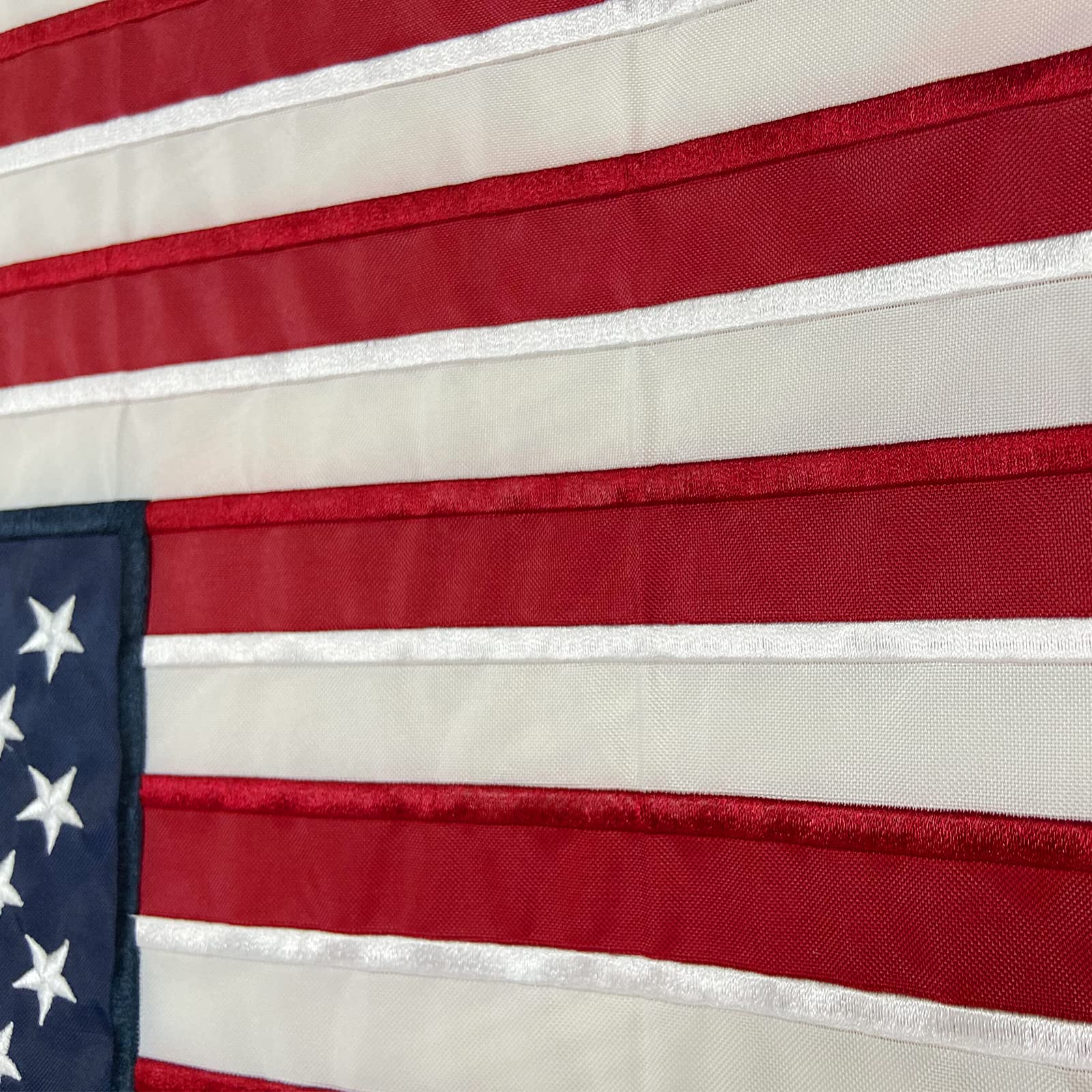 TOPFLAGS American Flag Garden Flag displayed in a garden setting