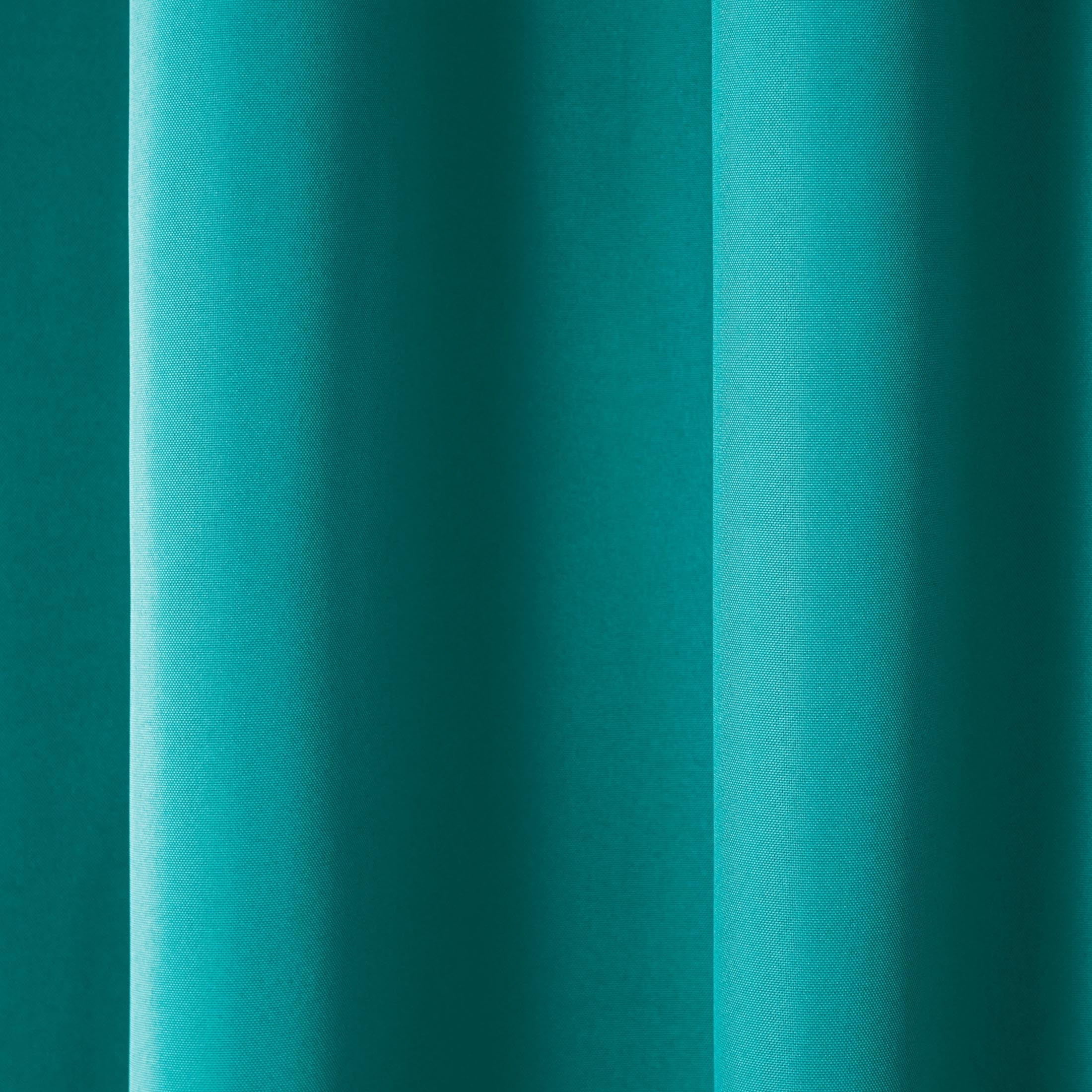 TOWN & COUNTRY BASICS Cabana Curtains hanging on a patio