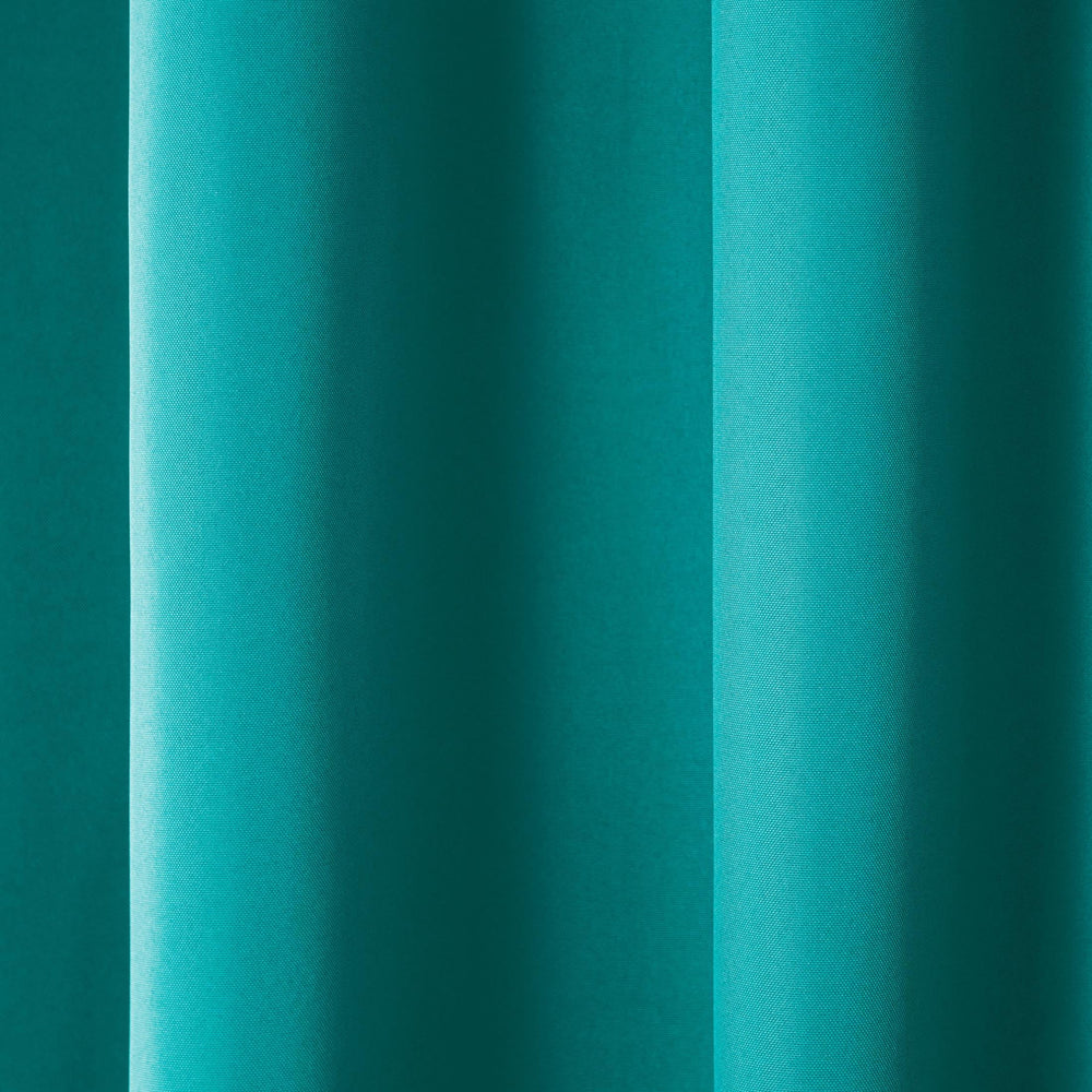 TOWN & COUNTRY BASICS Cabana Curtains hanging on a patio