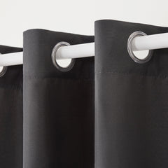 TOWN & COUNTRY BASICS Cabana curtains hanging on patio