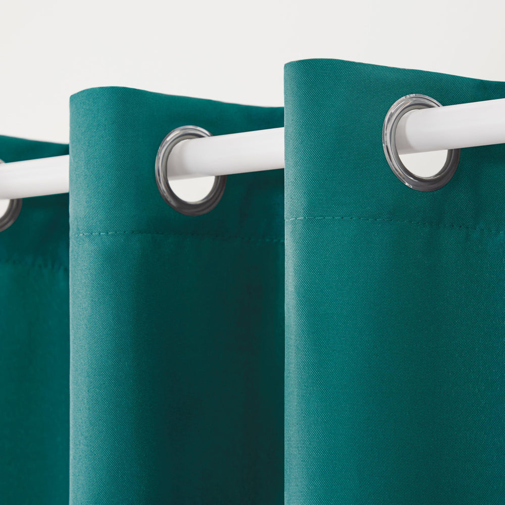 TOWN & COUNTRY BASICS Cabana Solid Heavyweight Outdoor Curtains, hanging on patio